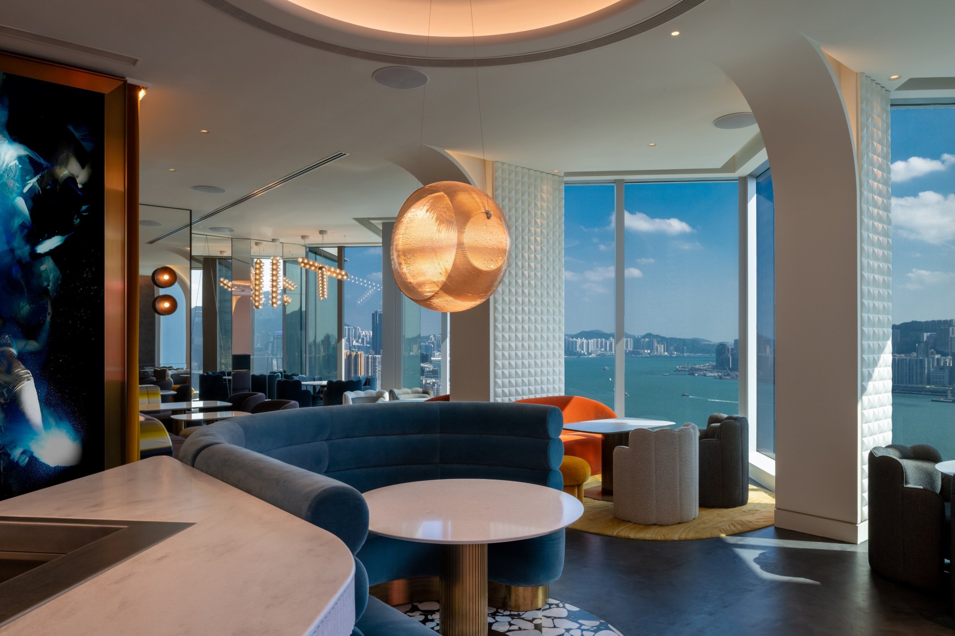 Velvet banquettes and harbour views in Avoca, the bar at Mondrian Hong Kong
